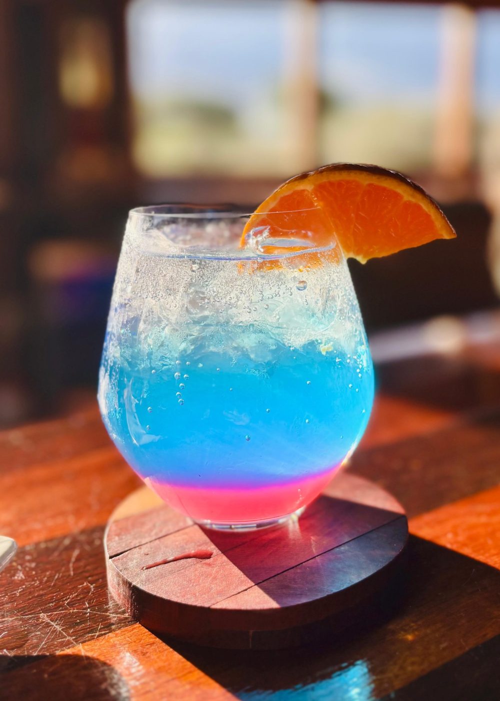 A blue drink on the deck at Infinite Safaris Africa